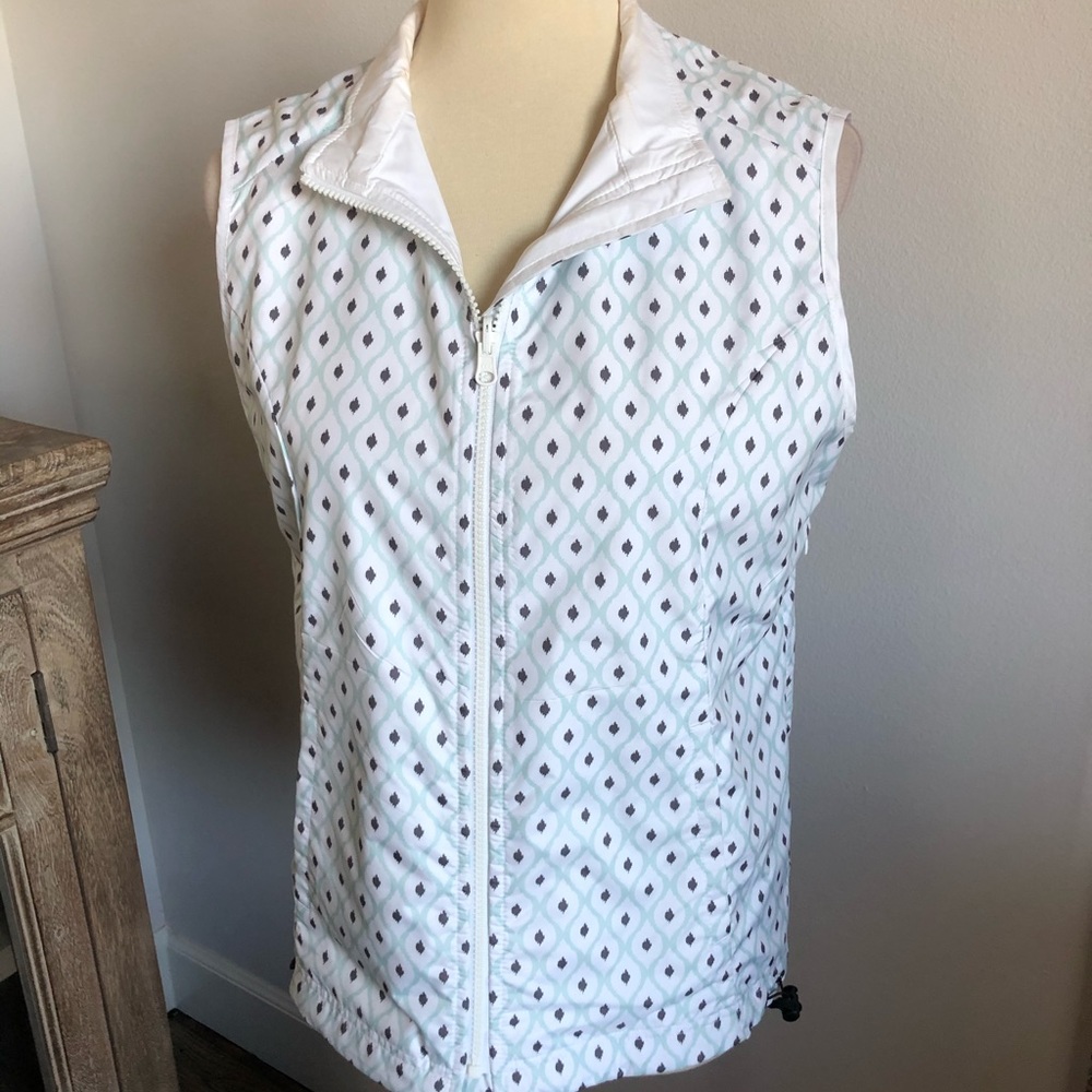 Reversible golf vest, windbreaker material